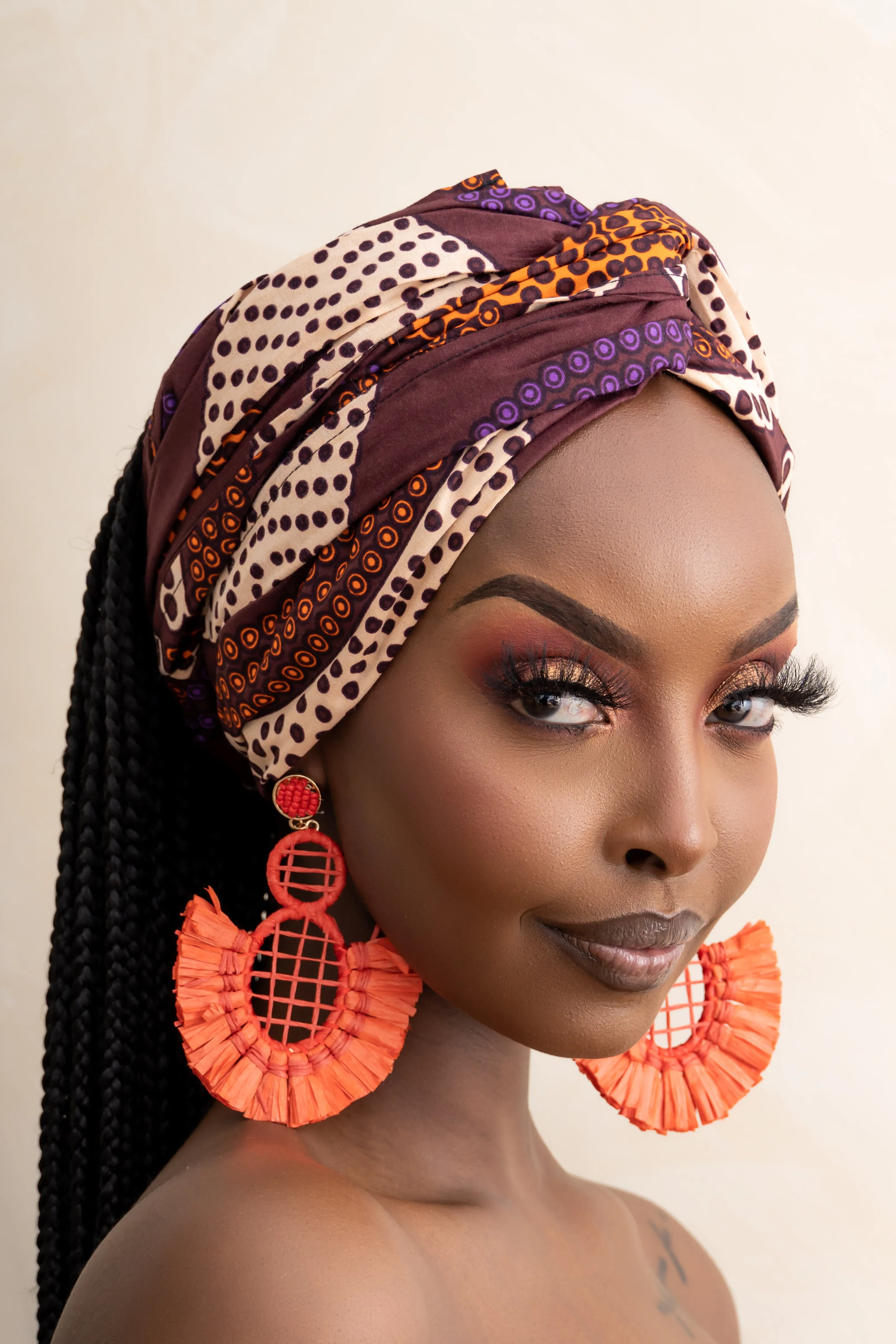 NARI EARRINGS in orange-red