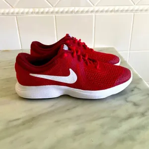 Nike Revolution Red and White Sneakers