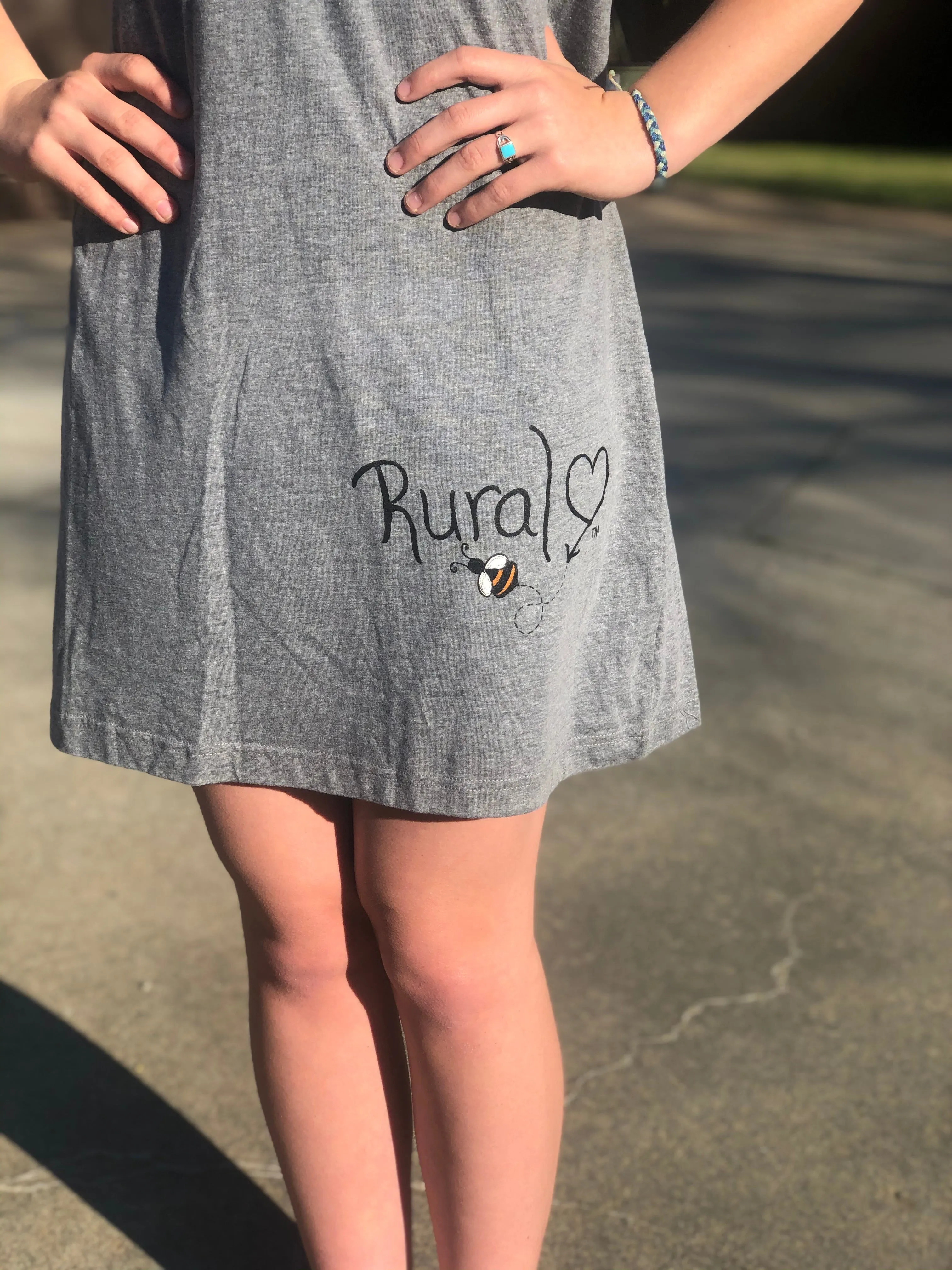 *SOLD OUT*Rural Heart by Rene’ Earnhardt V-neck T-shirt dress featuring the Rural Heart logo with bumblebee. Super cute, super comfortable casual dress for any summer day!